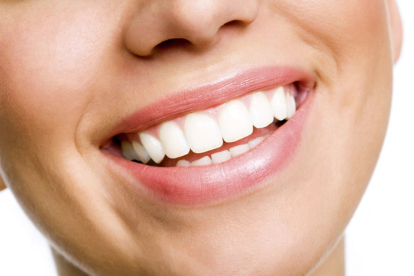 Bright white toothed woman smiles for the photo