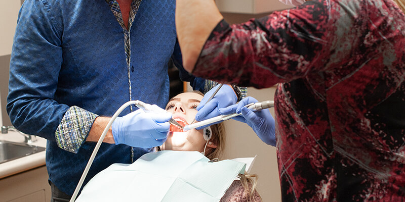 Image of one of our patients getting her teeth cleaned